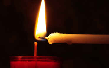 Candle being lit